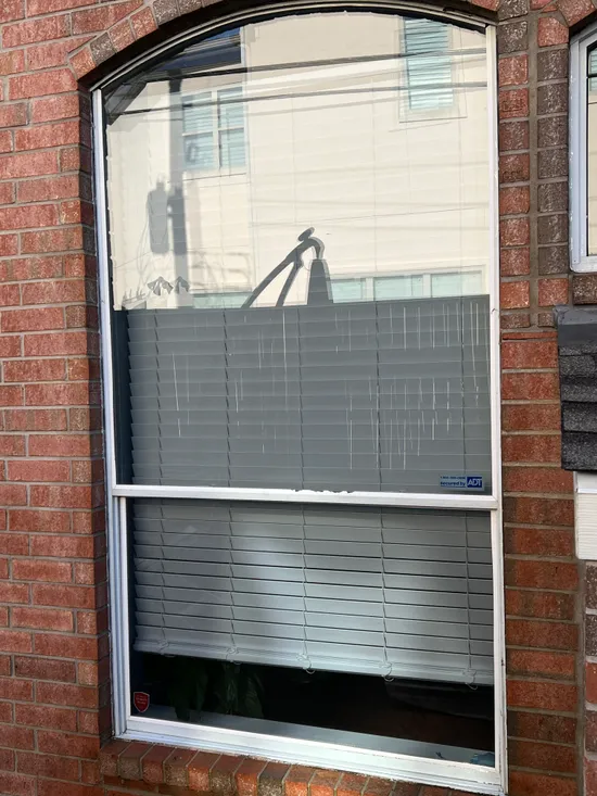 Detailed interior residential window glass after cleaning